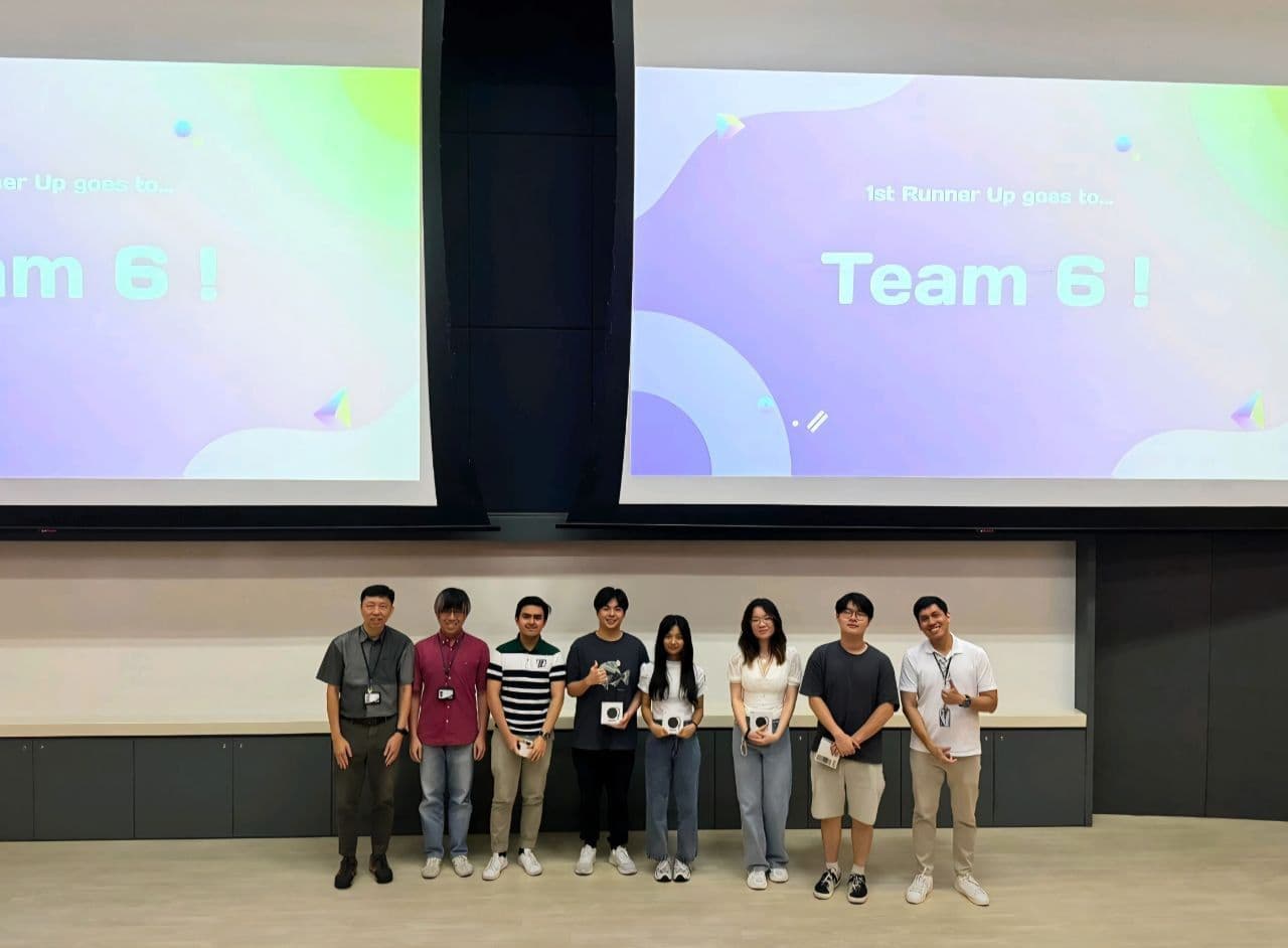 Receiving an award at the hackathon ceremony